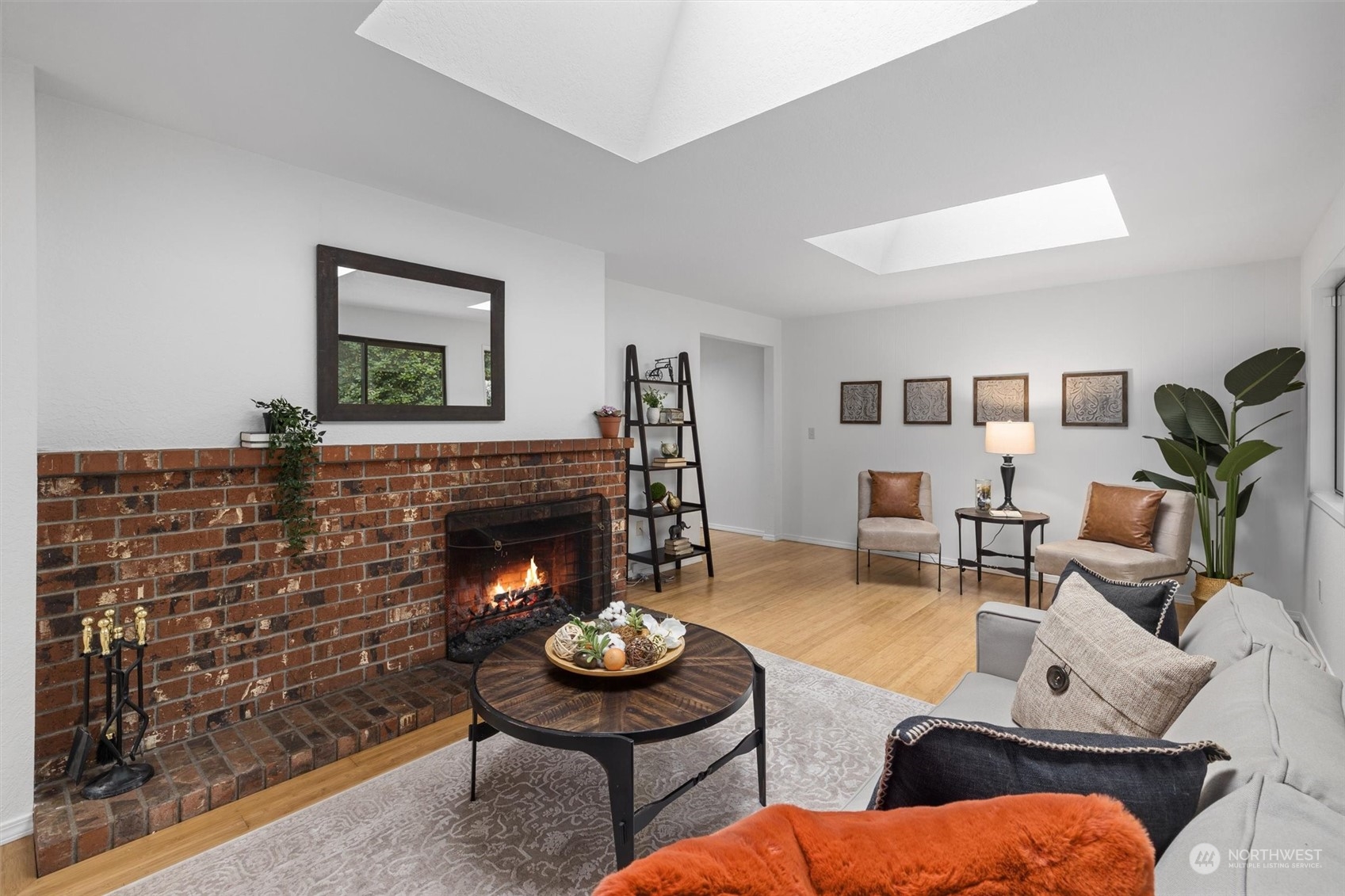 17631 7th Avenue West Bothell, WA 98012 - Photo 11 of 38 a living room with furniture and a fireplace