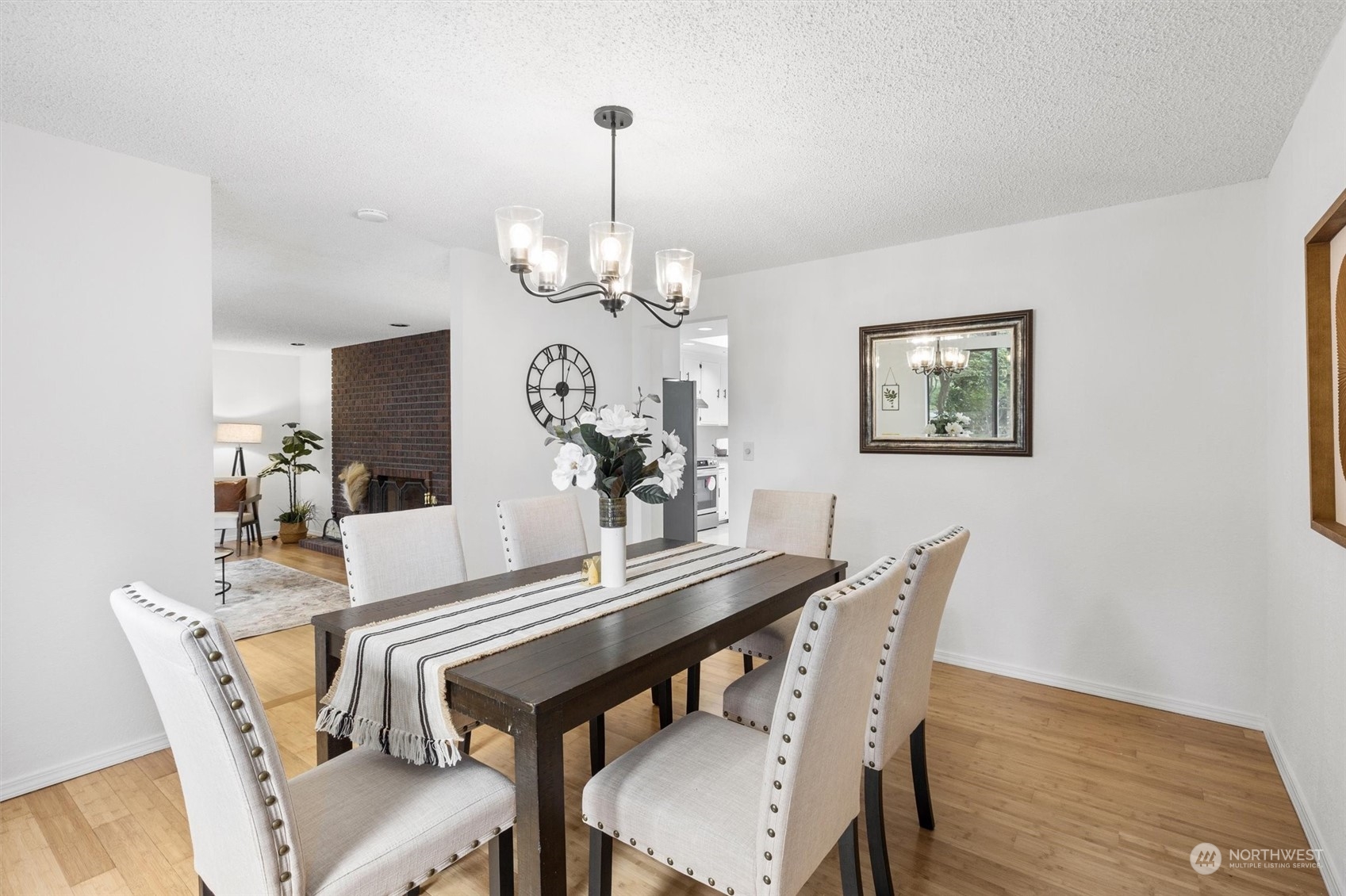 17631 7th Avenue West Bothell, WA 98012 - Photo 12 of 38 a view of a dining room with furniture and wooden floor