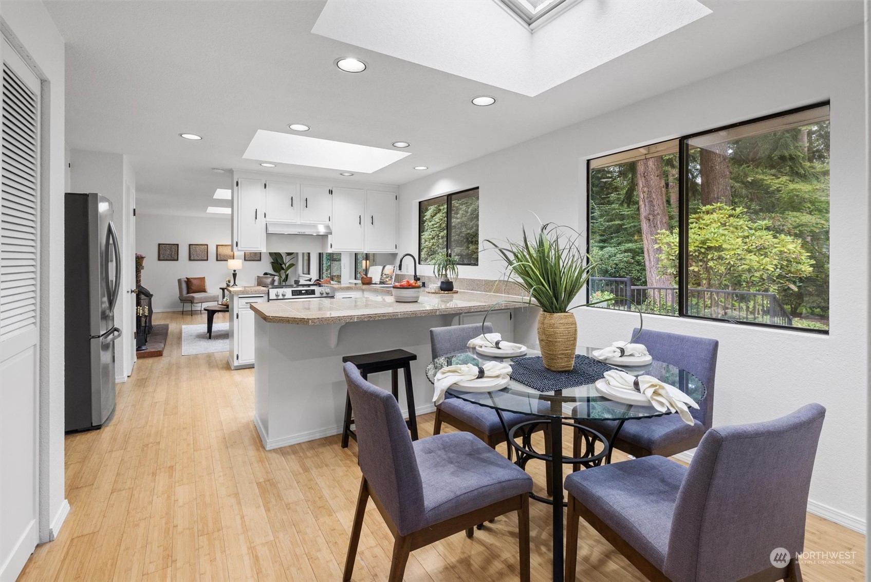 17631 7th Avenue West Bothell, WA 98012 - Photo 15 of 38 a dining room with furniture and wooden floor
