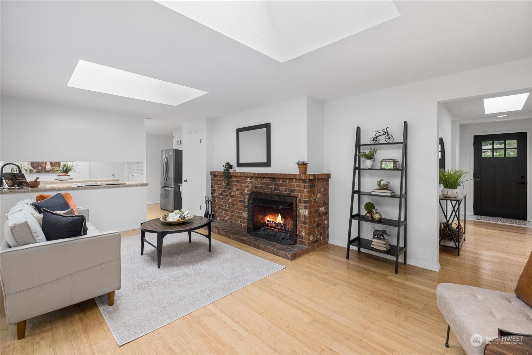 17631 7th Avenue West Bothell, WA 98012 - Photo 21 of 38 a living room with furniture and a fireplace