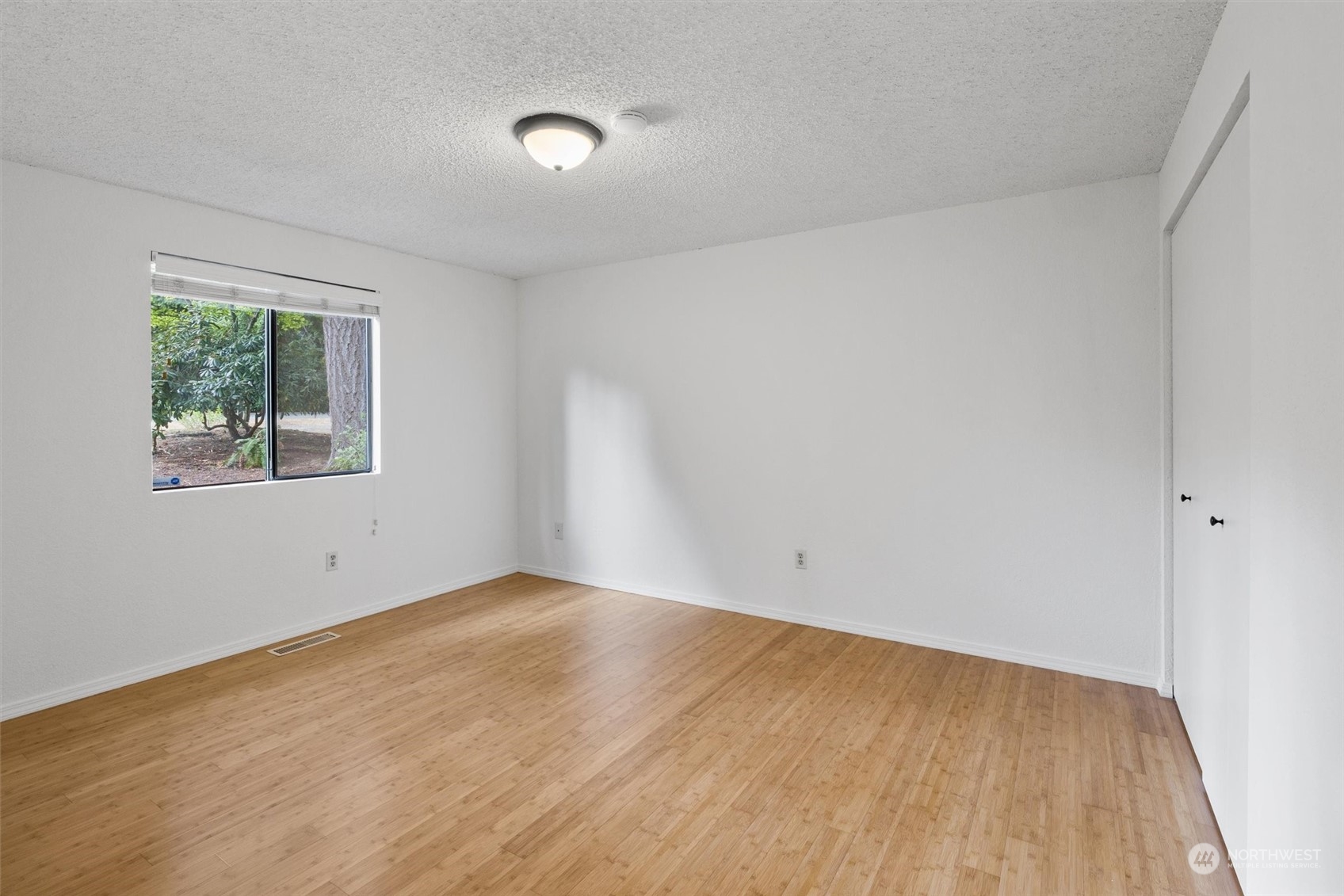 17631 7th Avenue West Bothell, WA 98012 - Photo 23 of 38 an empty room with a window