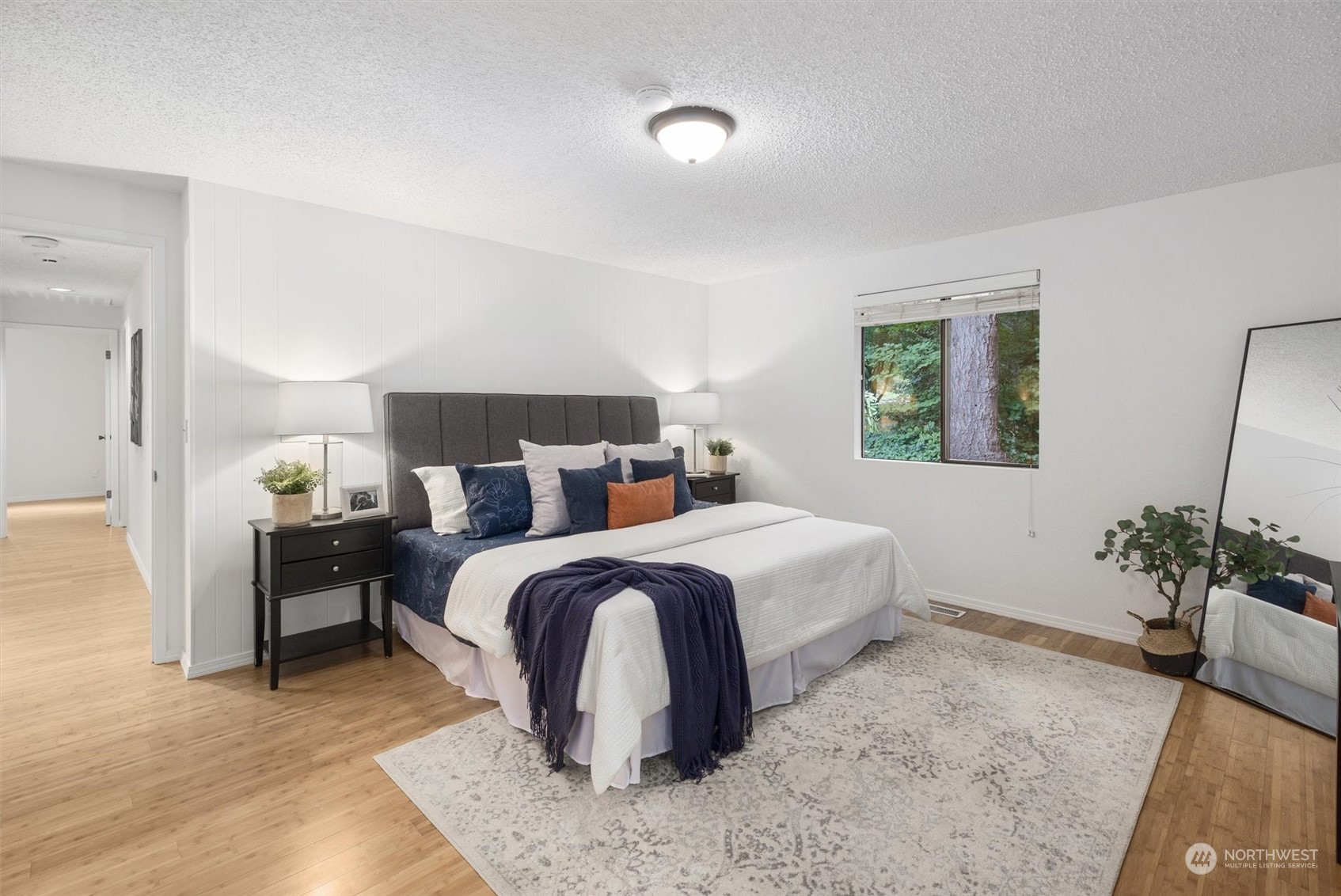 17631 7th Avenue West Bothell, WA 98012 - Photo 26 of 38 a bedroom with a bed and a potted plant