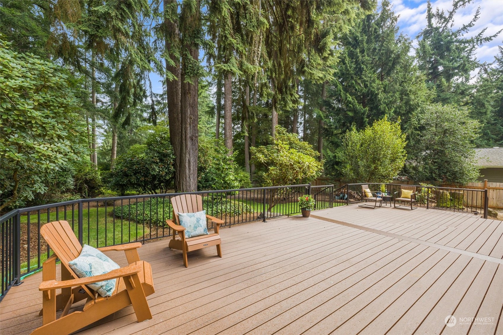 17631 7th Avenue West Bothell, WA 98012 - Photo 29 of 38 a view of a lake with couches and wooden floor