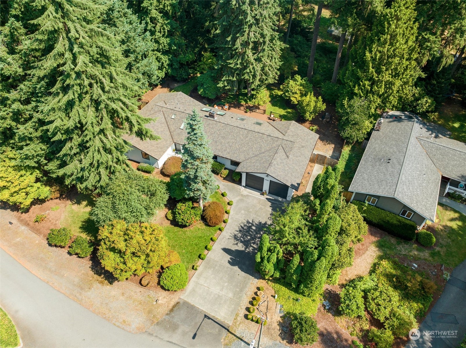 17631 7th Avenue West Bothell, WA 98012 - Photo 3 of 38 an aerial view of a house with a yard and garden