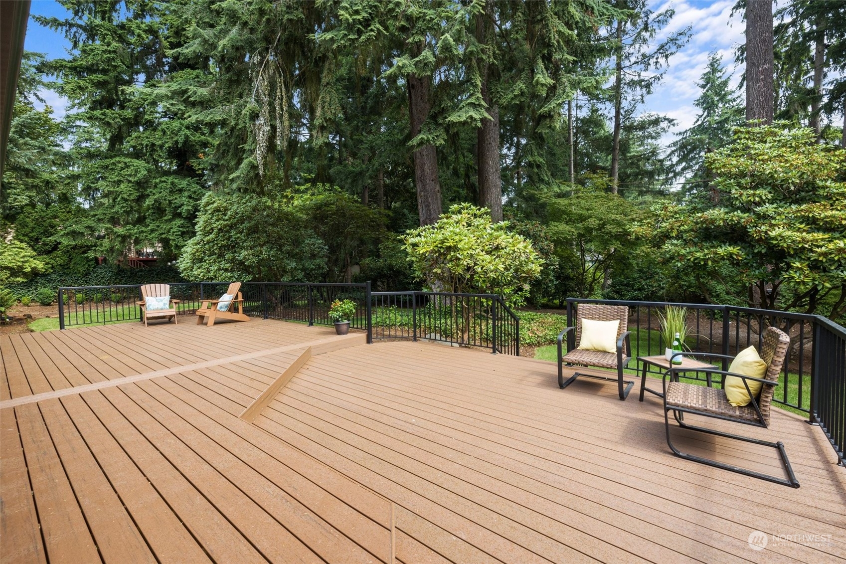 17631 7th Avenue West Bothell, WA 98012 - Photo 31 of 38 a park view with a bench and floor to ceiling windows