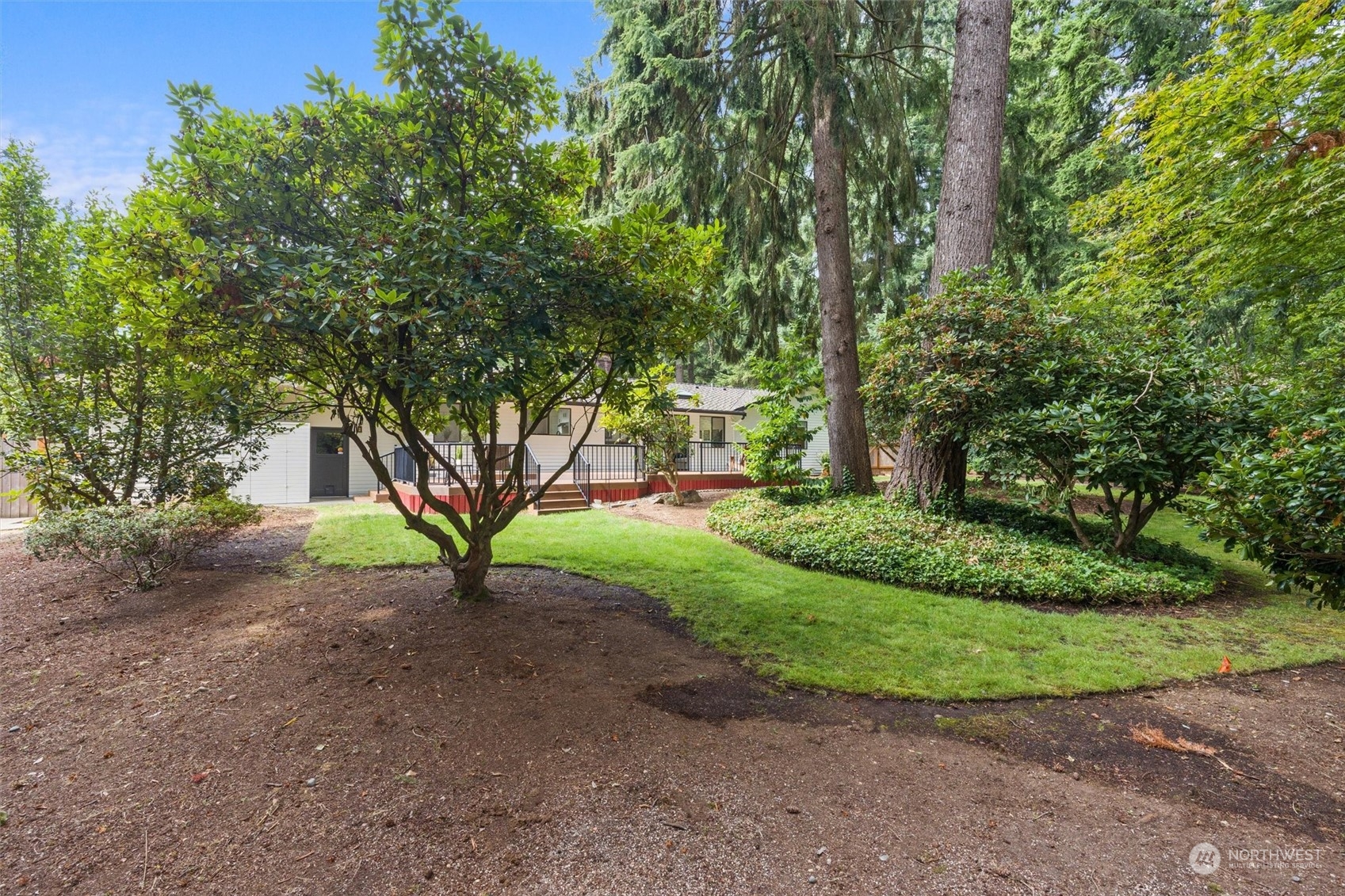 17631 7th Avenue West Bothell, WA 98012 - Photo 35 of 38 a view of a yard with plants and trees