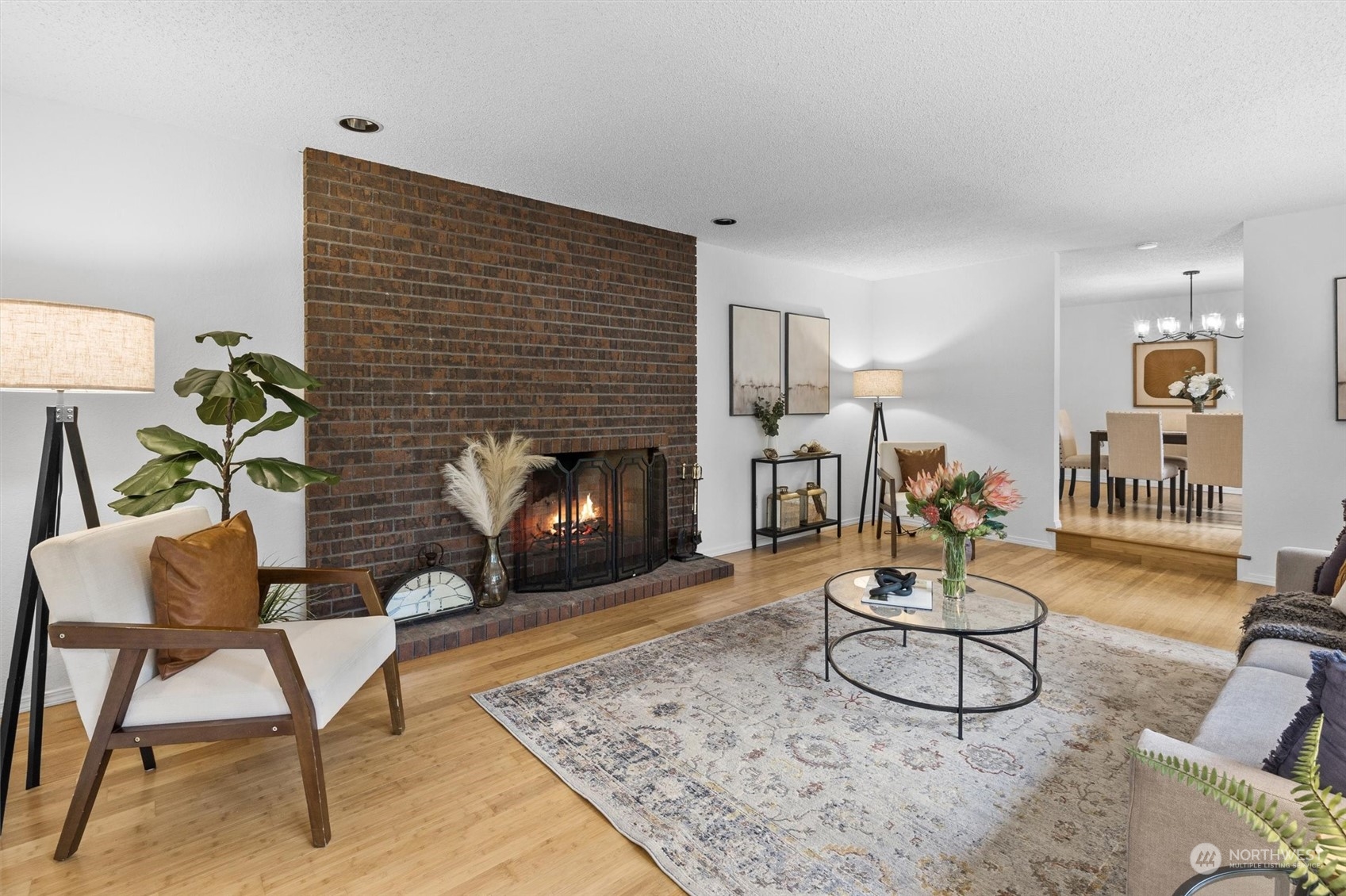 17631 7th Avenue West Bothell, WA 98012 - Photo 8 of 38 a living room with furniture and a fireplace