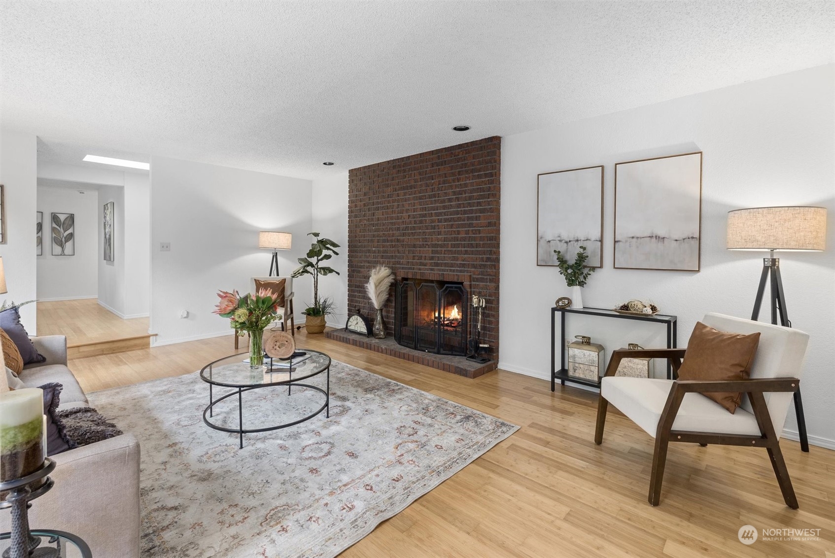 17631 7th Avenue West Bothell, WA 98012 - Photo 10 of 38 a living room with furniture and a fireplace