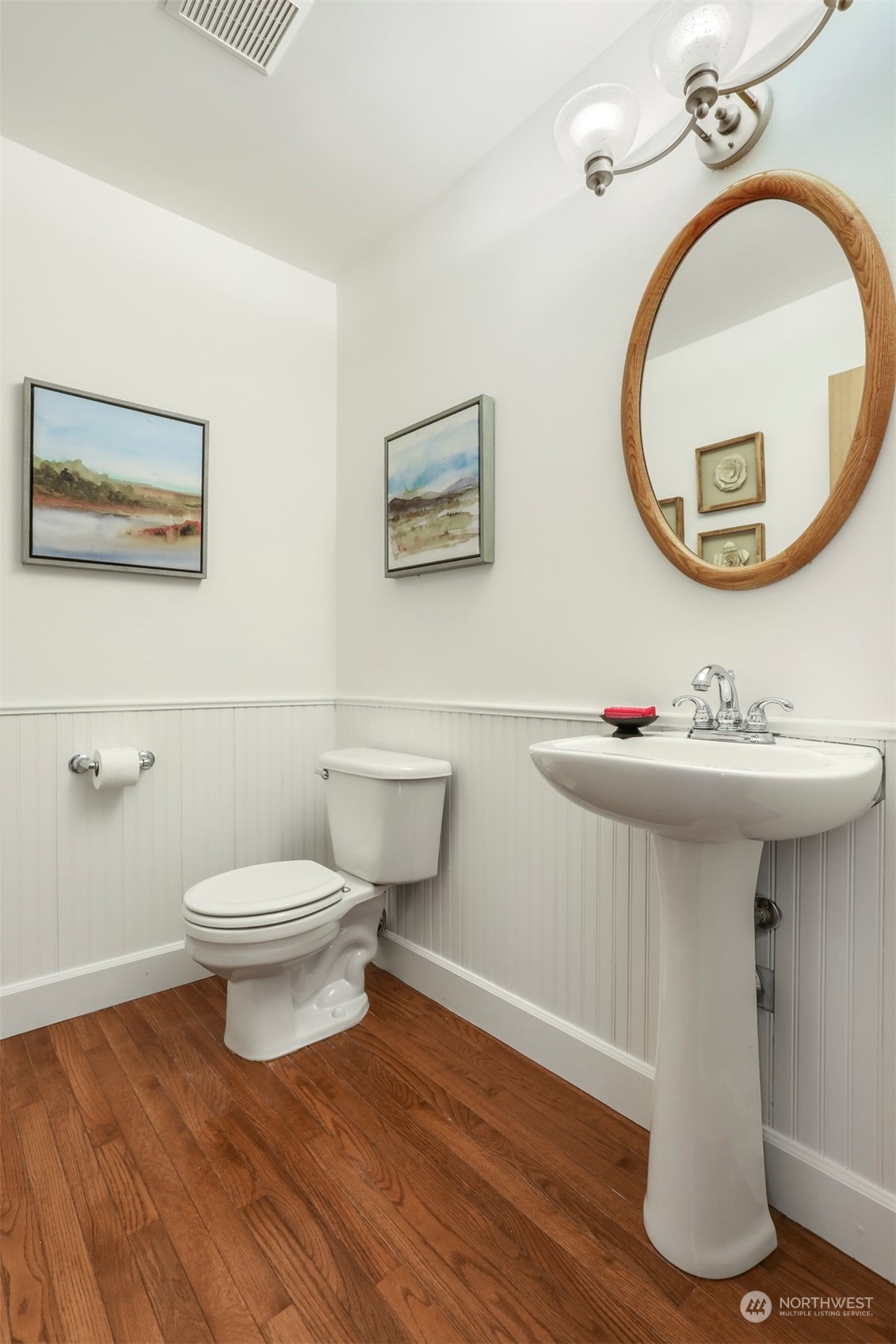 18819 1st Place West Bothell, WA 98012 - Photo 21 of 40 a bathroom with a toilet sink and mirror
