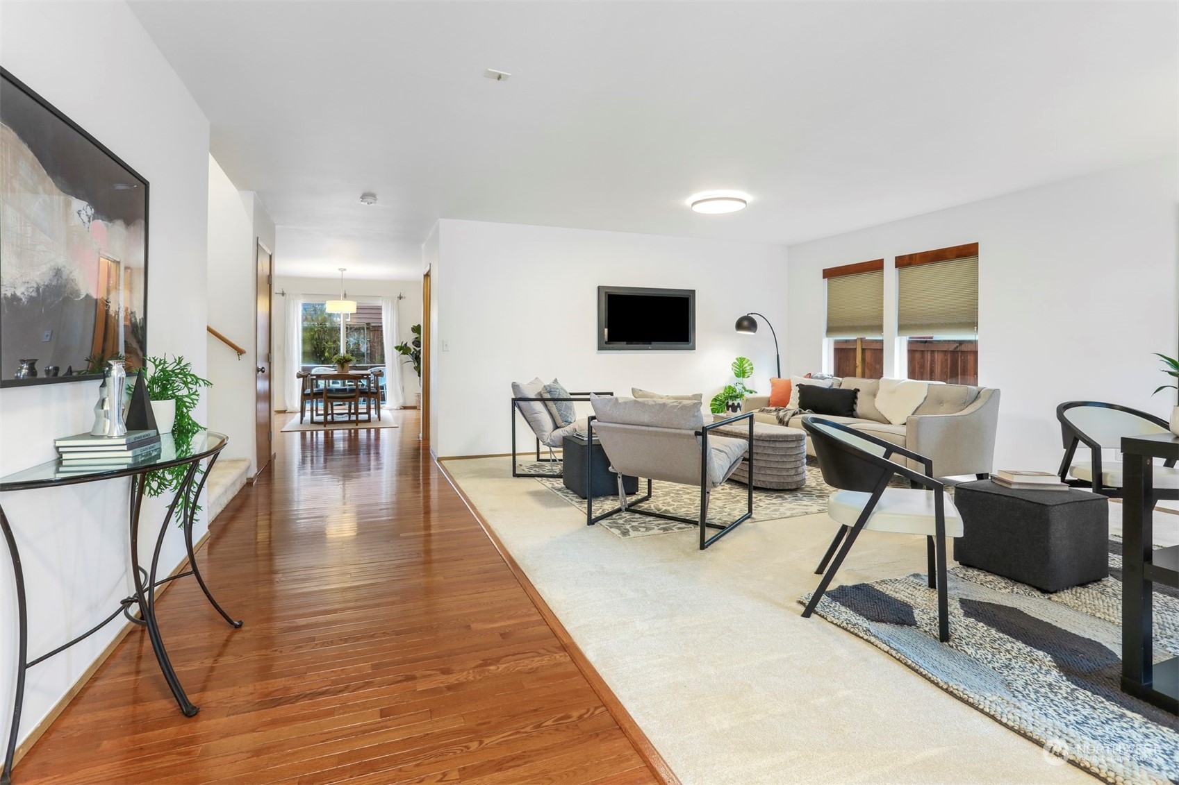 18819 1st Place West Bothell, WA 98012 - Photo 3 of 40 a living room with furniture and a flat screen tv