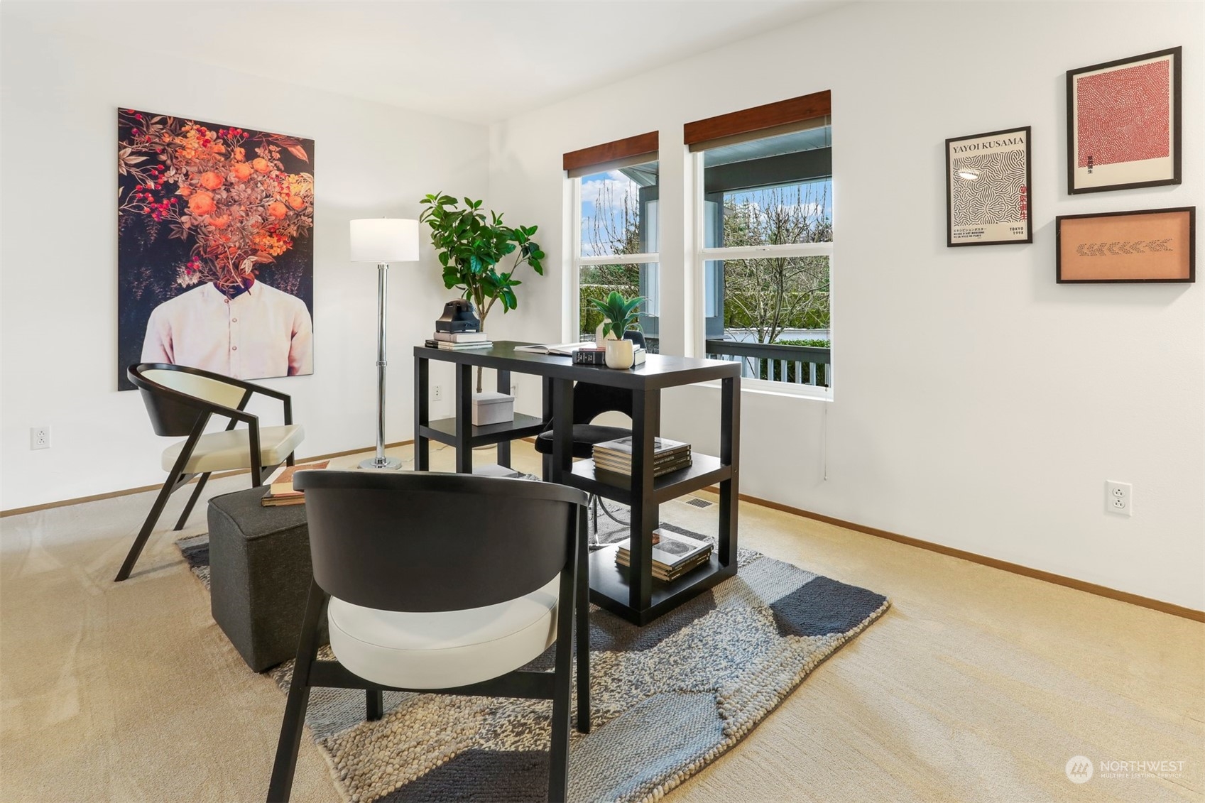 18819 1st Place West Bothell, WA 98012 - Photo 5 of 40 a view of a dining room with furniture window and wooden floor