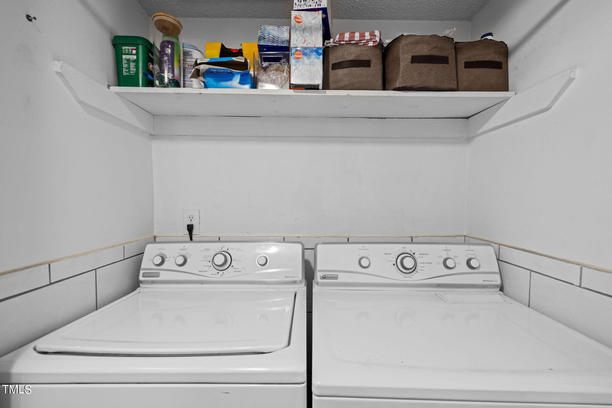 709 Godwin Court Raleigh, NC 27606 - Photo 22 of 31 a utility room with washer and dryer