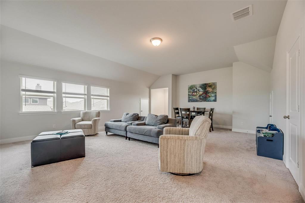 1271 Altuda Drive Forney, TX 75126 - Photo 16 of 35 a living room with furniture and a window