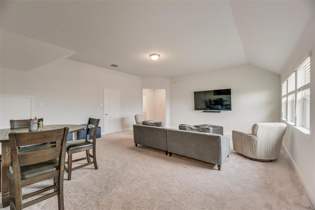 1271 Altuda Drive Forney, TX 75126 - Photo 17 of 35 a living room with furniture and a flat screen tv