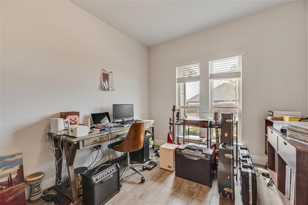 1271 Altuda Drive Forney, TX 75126 - Photo 23 of 35 a view of a workspace with furniture and a window