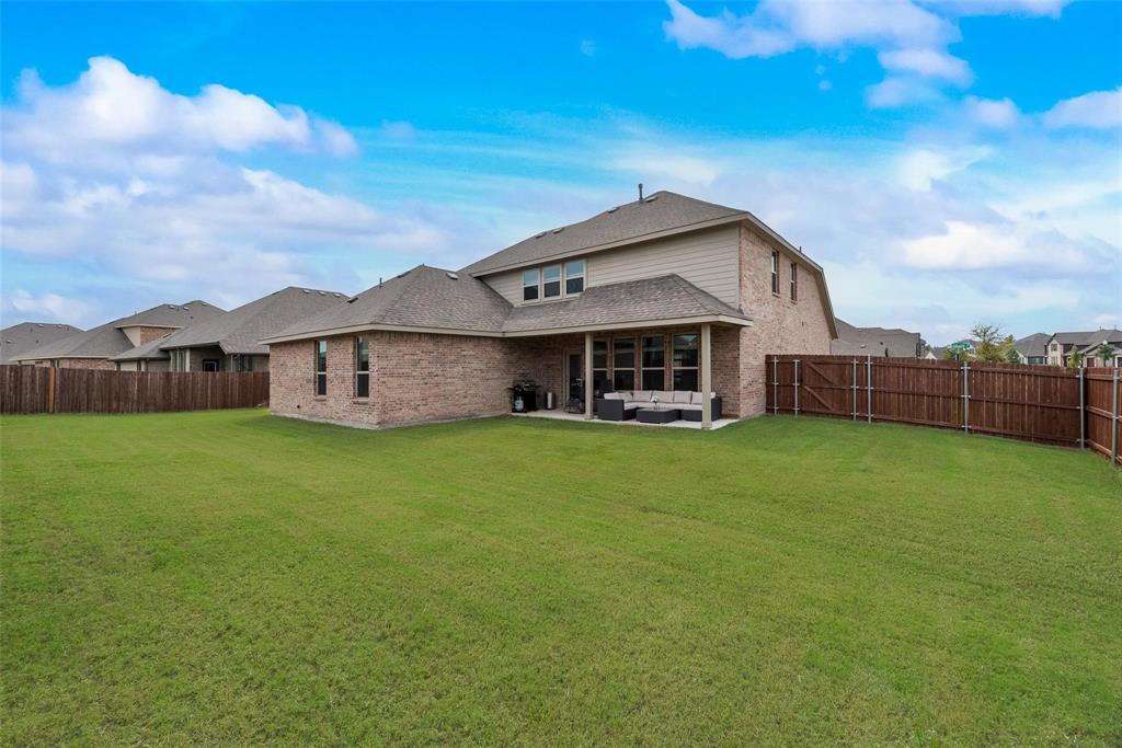 1271 Altuda Drive Forney, TX 75126 - Photo 29 of 35 a view of a house with a backyard