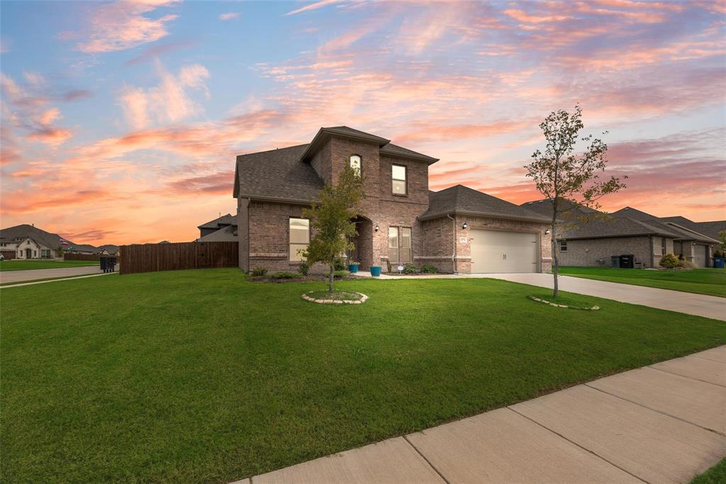 1271 Altuda Drive Forney, TX 75126 - Photo 32 of 35 a aerial view of a house with a big yard potted plants and large tree