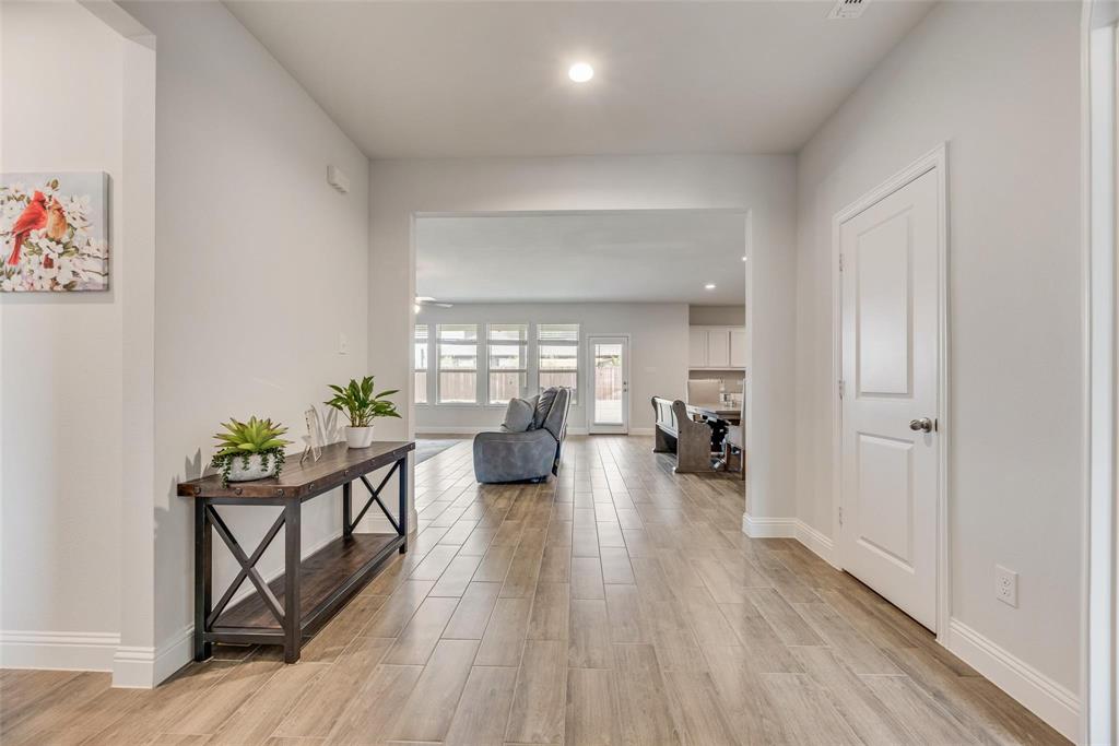 1271 Altuda Drive Forney, TX 75126 - Photo 5 of 35 a living room with furniture and a wooden floor