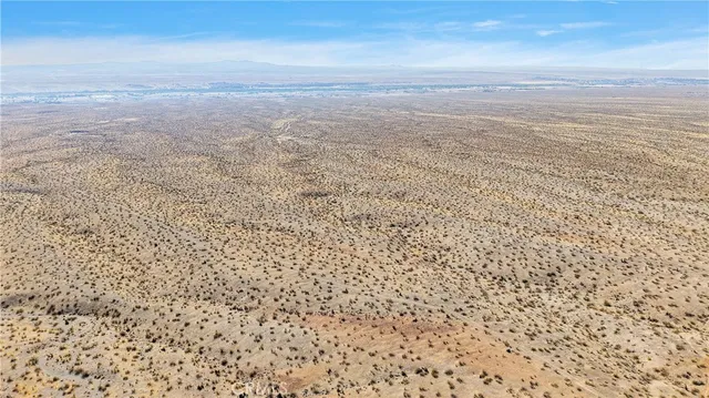 a view of beach and an ocean
