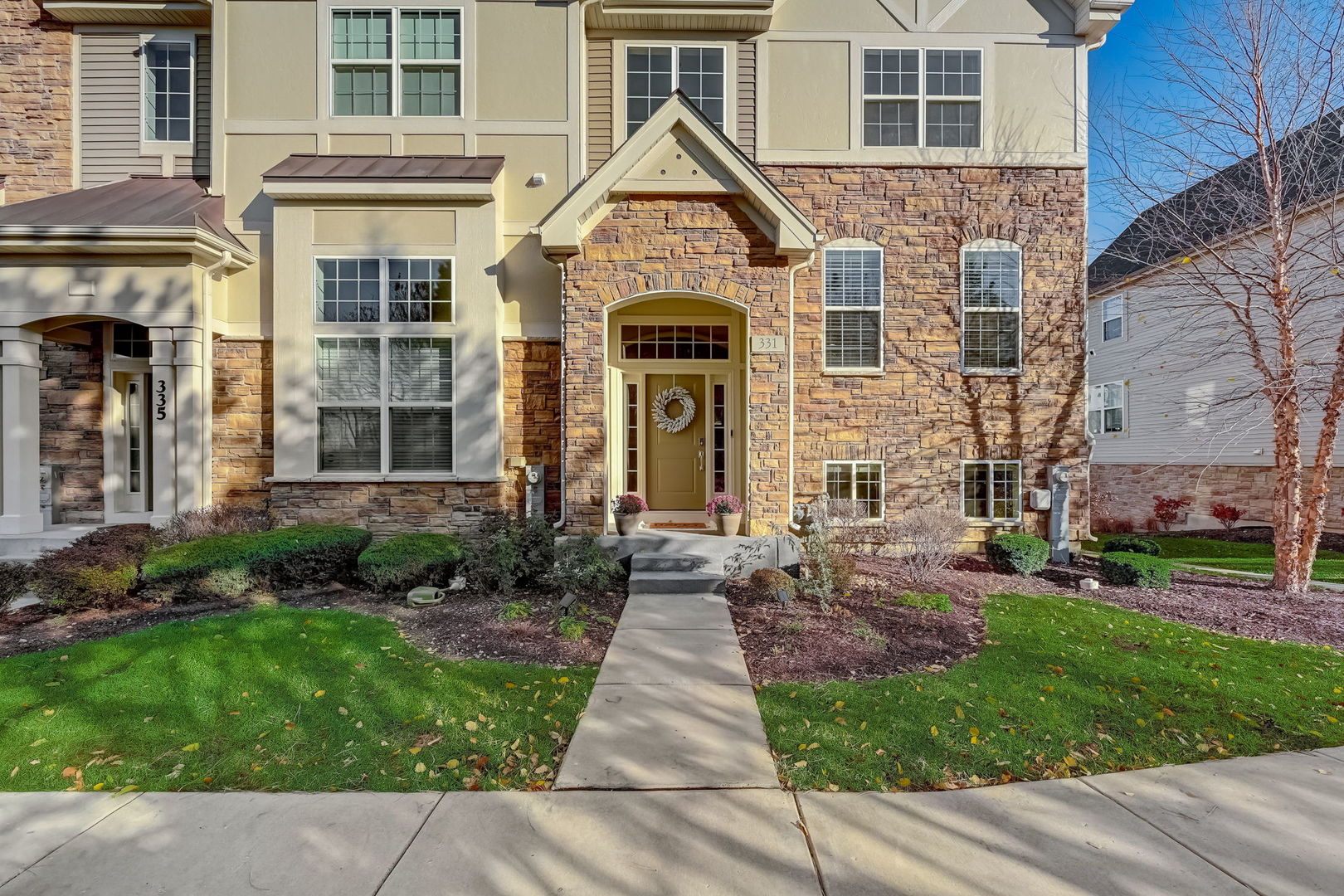 331 Saunders Circle Carol Stream, IL 60188 - Photo 1 of 1 a front view of a house with garden