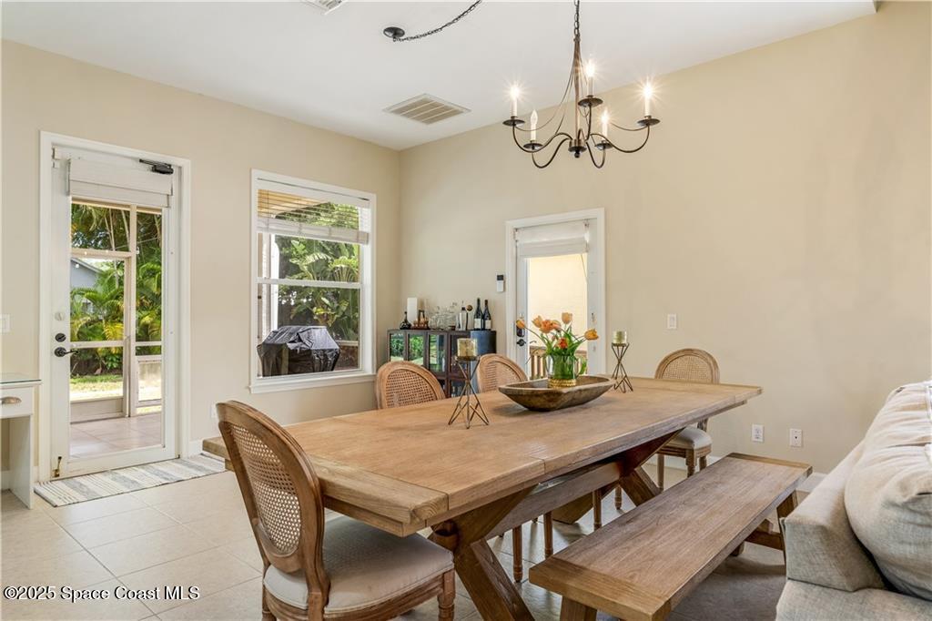 Undisclosed Address Vero Beach, FL 32966 - Photo 12 of 36 a view of a dining room with furniture window and outside view