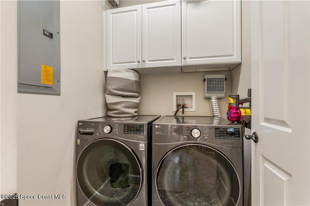 Undisclosed Address Vero Beach, FL 32966 - Photo 25 of 36 a utility room with dryer and washer