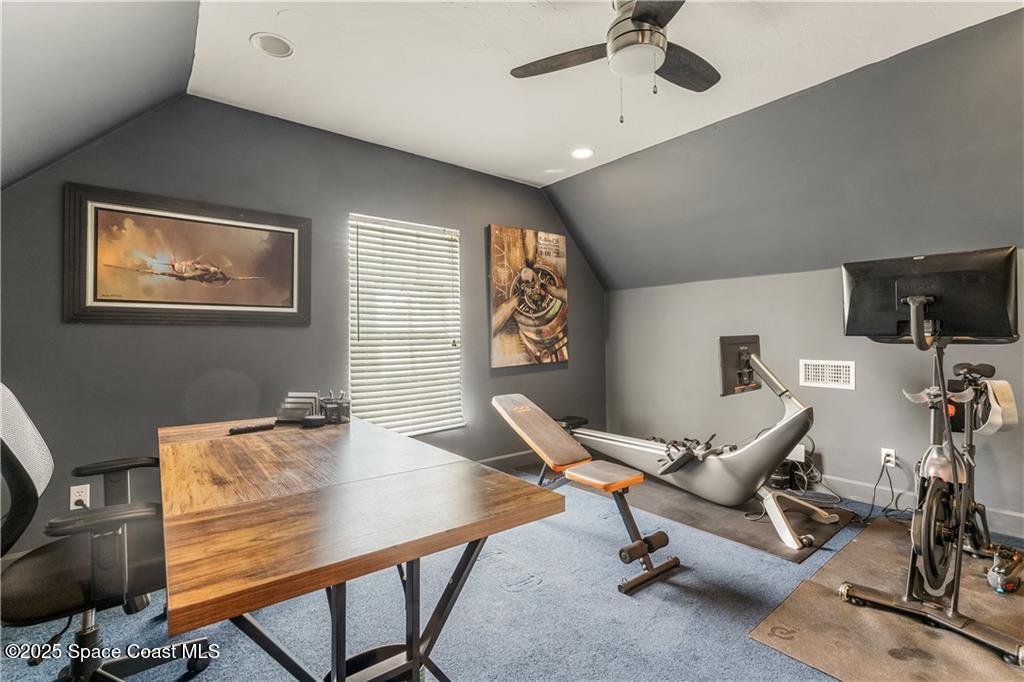 Undisclosed Address Vero Beach, FL 32966 - Photo 28 of 36 a view of a workspace with furniture and a window