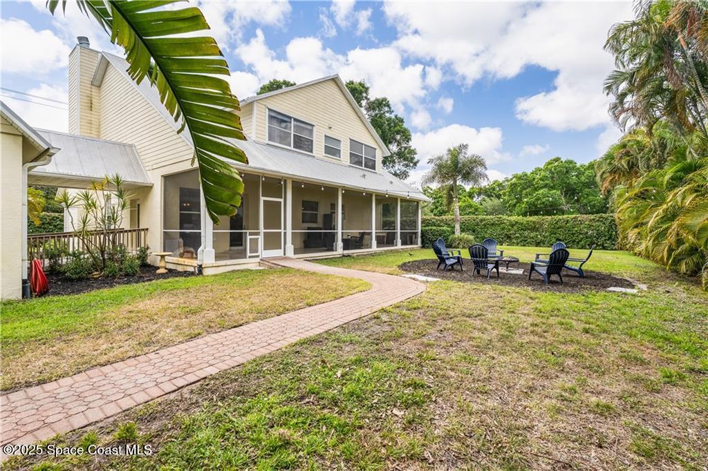 Undisclosed Address Vero Beach, FL 32966 - Photo 32 of 36 a view of a house with a backyard