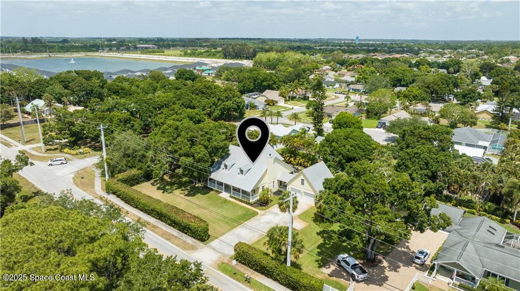 Undisclosed Address Vero Beach, FL 32966 - Photo 6 of 36 a view of a swimming pool and lake