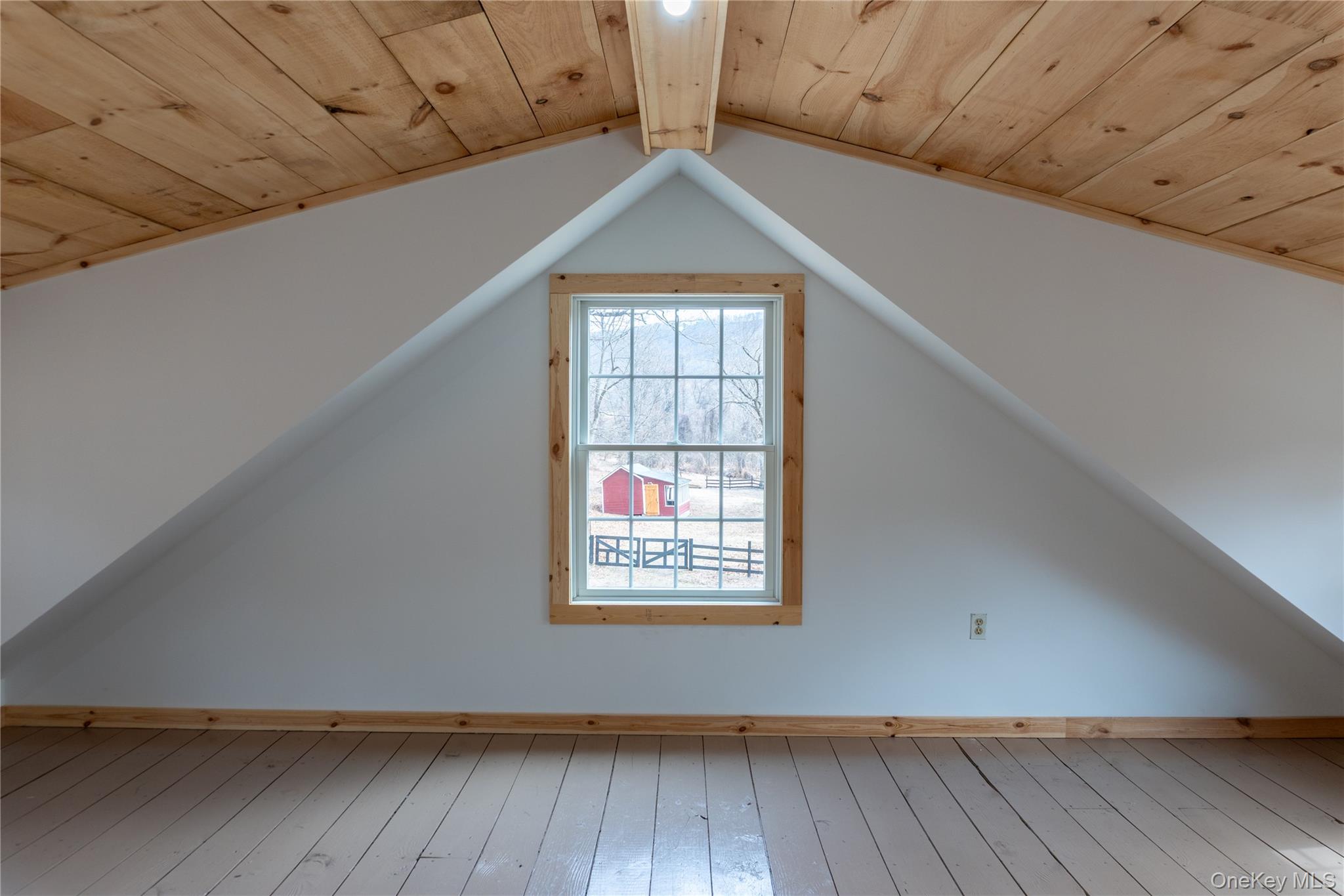 523 Shenandoah Road Hopewell Junction, NY 12533 - Photo 12 of 27 a view of an empty room with wooden floor and a window