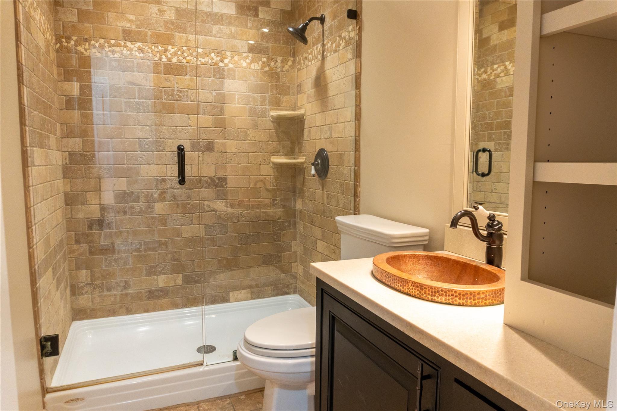 523 Shenandoah Road Hopewell Junction, NY 12533 - Photo 7 of 27 a bathroom with a sink a toilet and shower