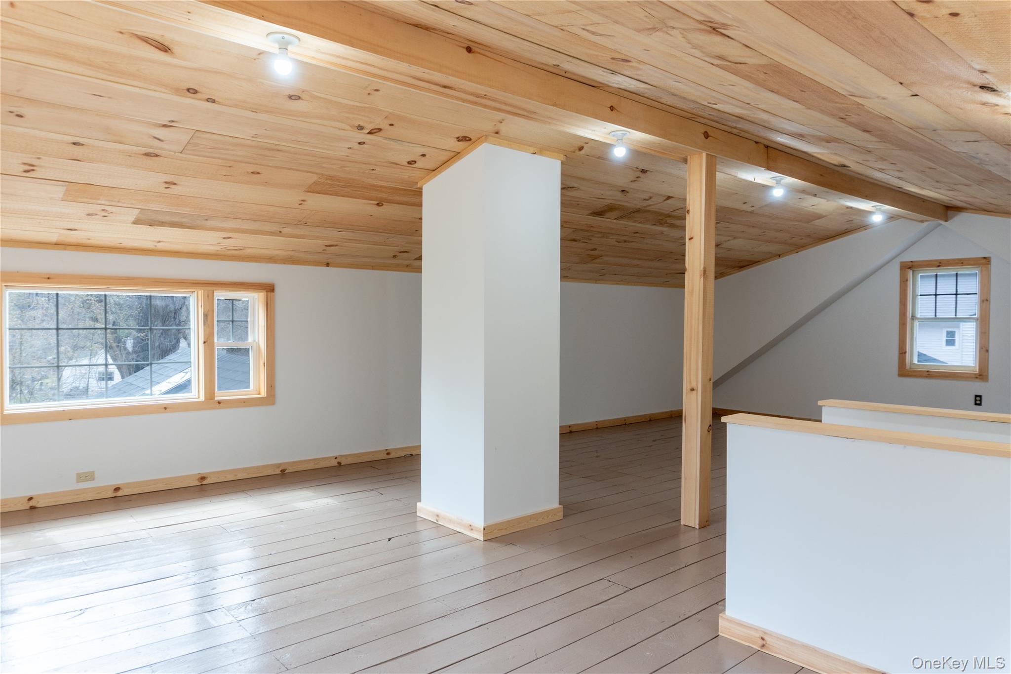 523 Shenandoah Road Hopewell Junction, NY 12533 - Photo 10 of 27 a view of an empty room with wooden floor and a window