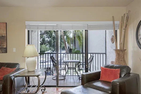 a living room with furniture and a window