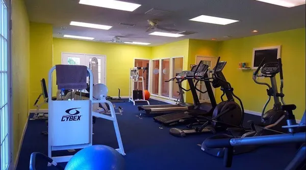 a view of a room with gym equipment