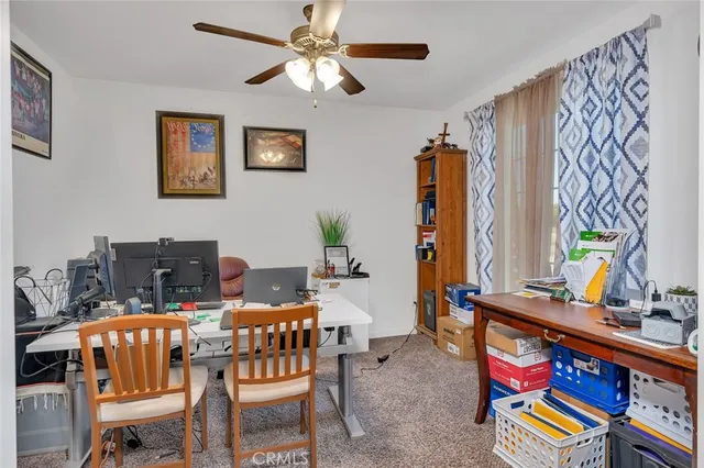 a bathroom with a toilet a sink and a mirror