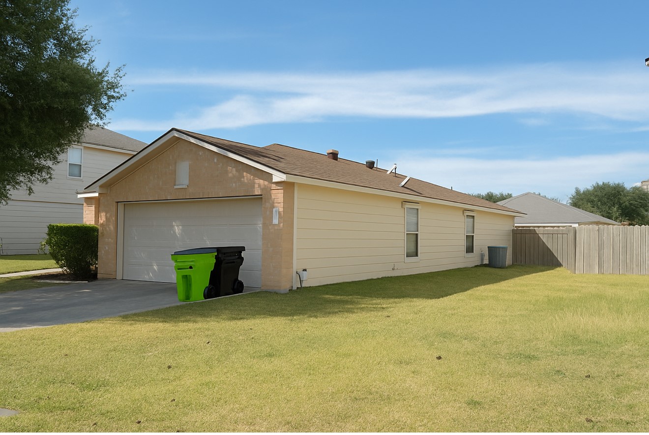 1130 Desert Springs Lane Rosenberg, TX 77471 - Photo 5 of 7 a front view of a house with a yard