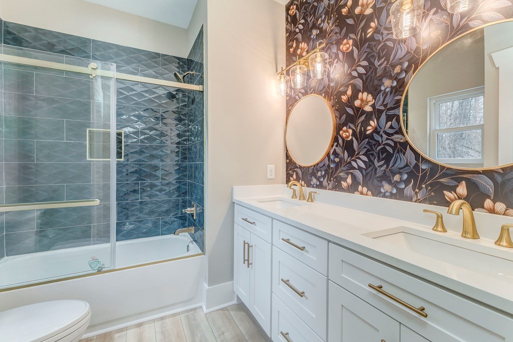 79 Logan Lane Ellijay, GA 30540 - Photo 15 of 56 a bathroom with a sink and a mirror