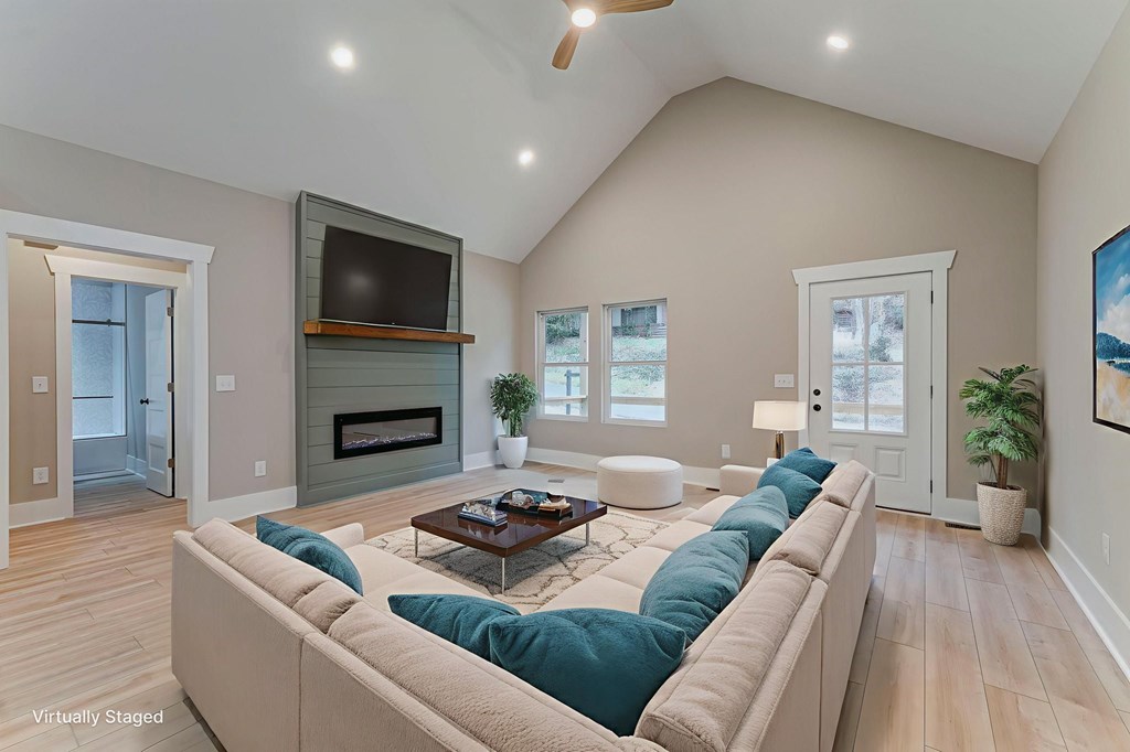 79 Logan Lane Ellijay, GA 30540 - Photo 23 of 56 a living room with furniture and a fireplace