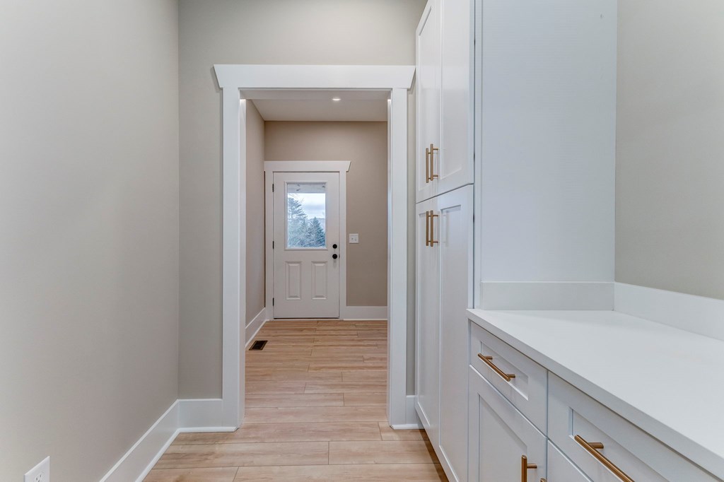 79 Logan Lane Ellijay, GA 30540 - Photo 36 of 56 a bathroom with a sink and mirror