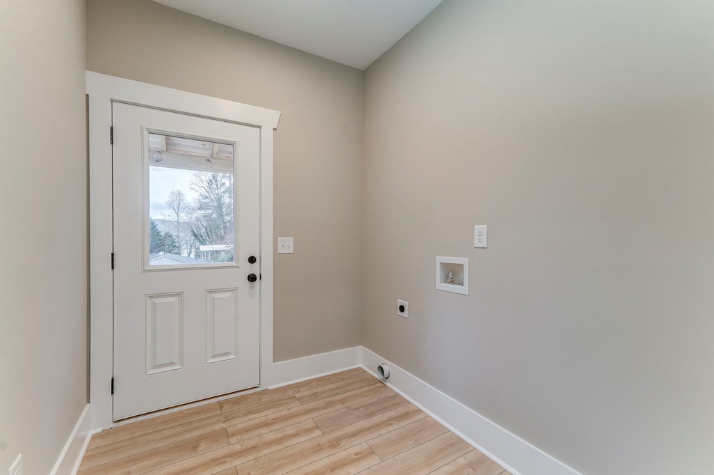 79 Logan Lane Ellijay, GA 30540 - Photo 37 of 56 a view of an empty room with wooden floor and closet