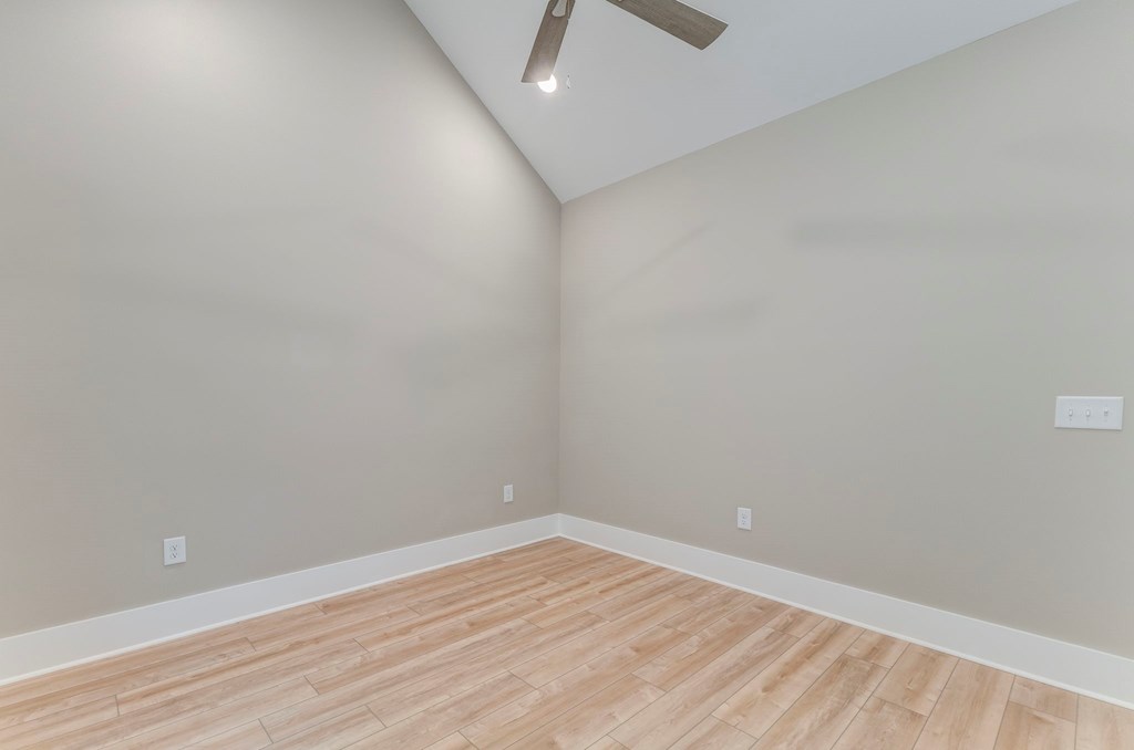79 Logan Lane Ellijay, GA 30540 - Photo 42 of 56 a view of an empty room with wooden floor