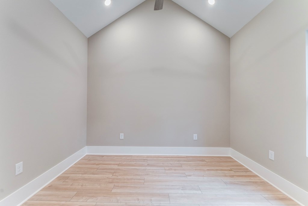 79 Logan Lane Ellijay, GA 30540 - Photo 47 of 56 a view of an empty room with wooden floor and a window