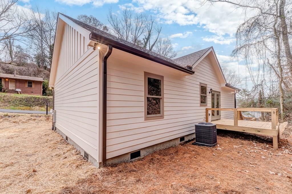 79 Logan Lane Ellijay, GA 30540 - Photo 53 of 56 a view of a house with a yard