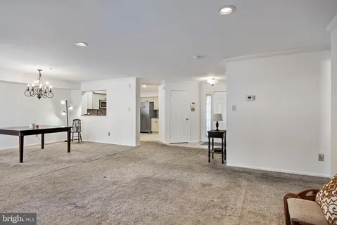a view of livingroom with furniture and a ceiling fan