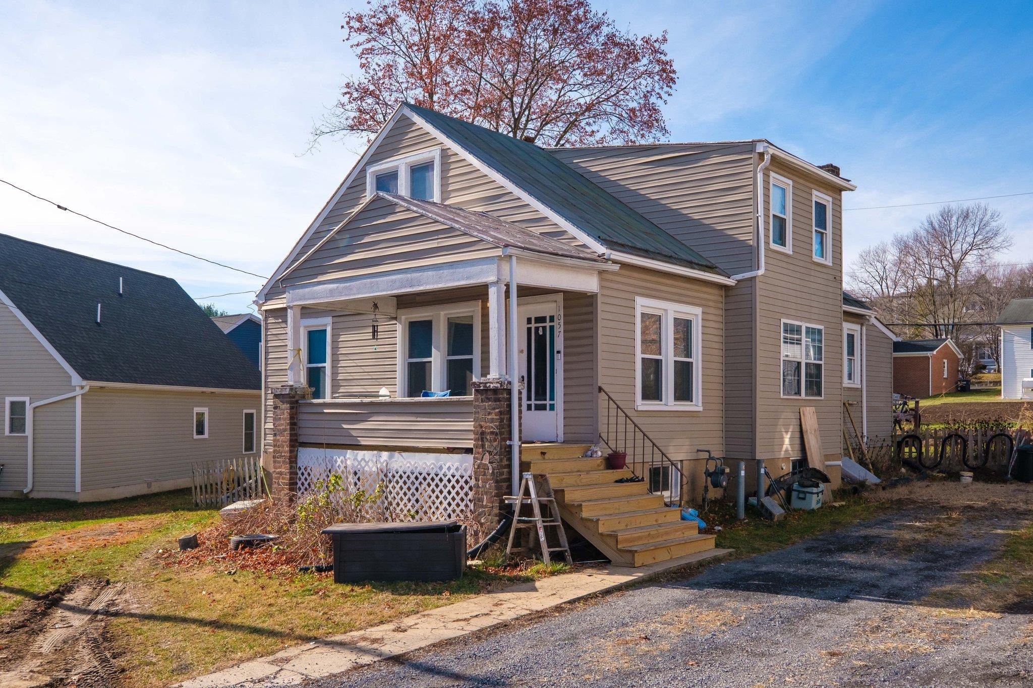 1057 Park Road Harrisonburg, VA 22802 - Photo 1 of 24 a front view of a house with a yard