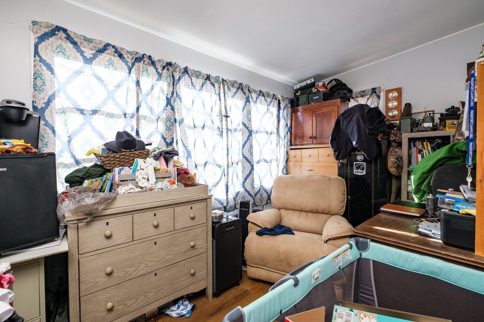 1057 Park Road Harrisonburg, VA 22802 - Photo 14 of 24 a view of walk in closet with clothes and shoes