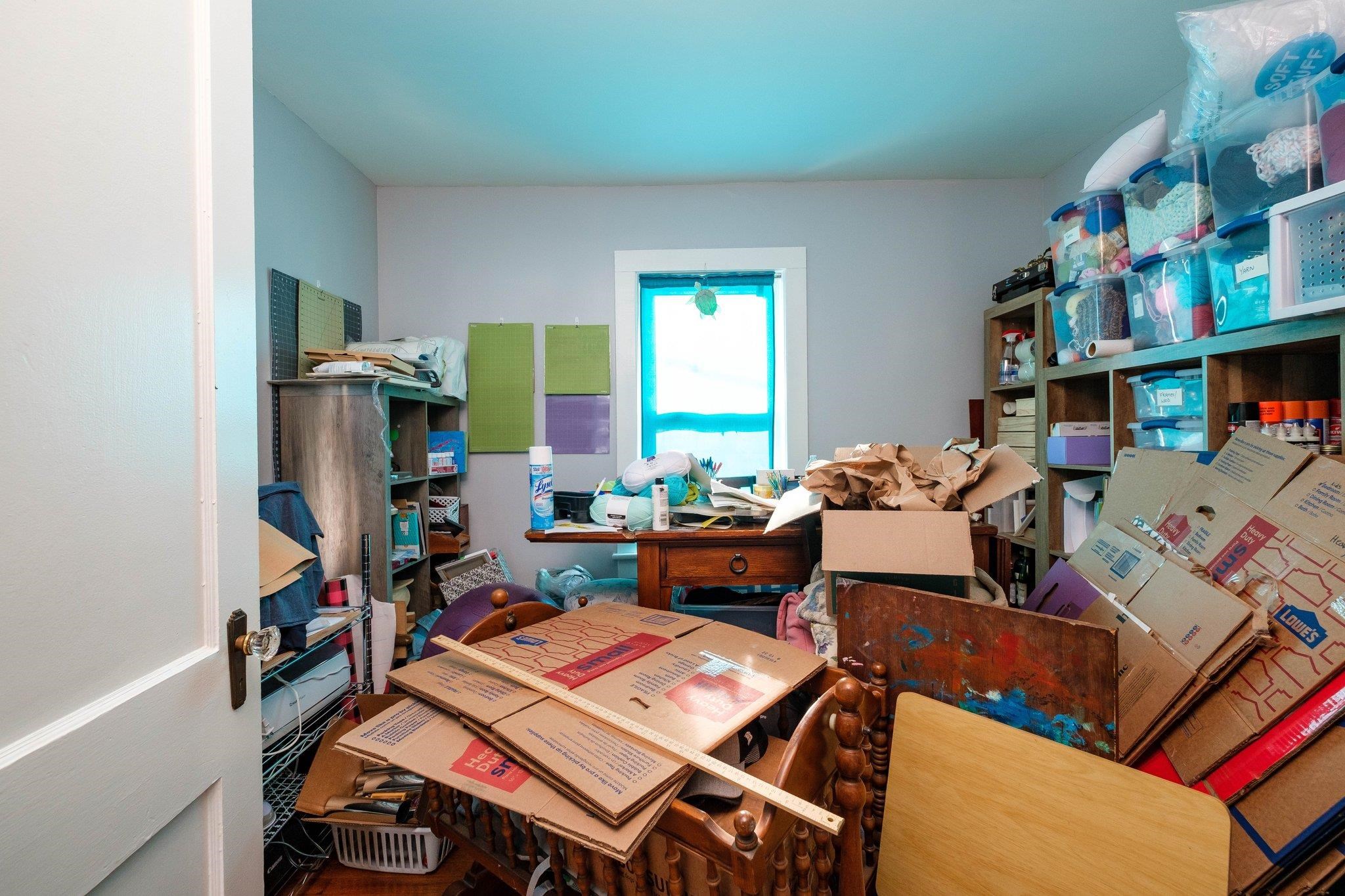 1057 Park Road Harrisonburg, VA 22802 - Photo 17 of 24 a work room with furniture and a book shelf