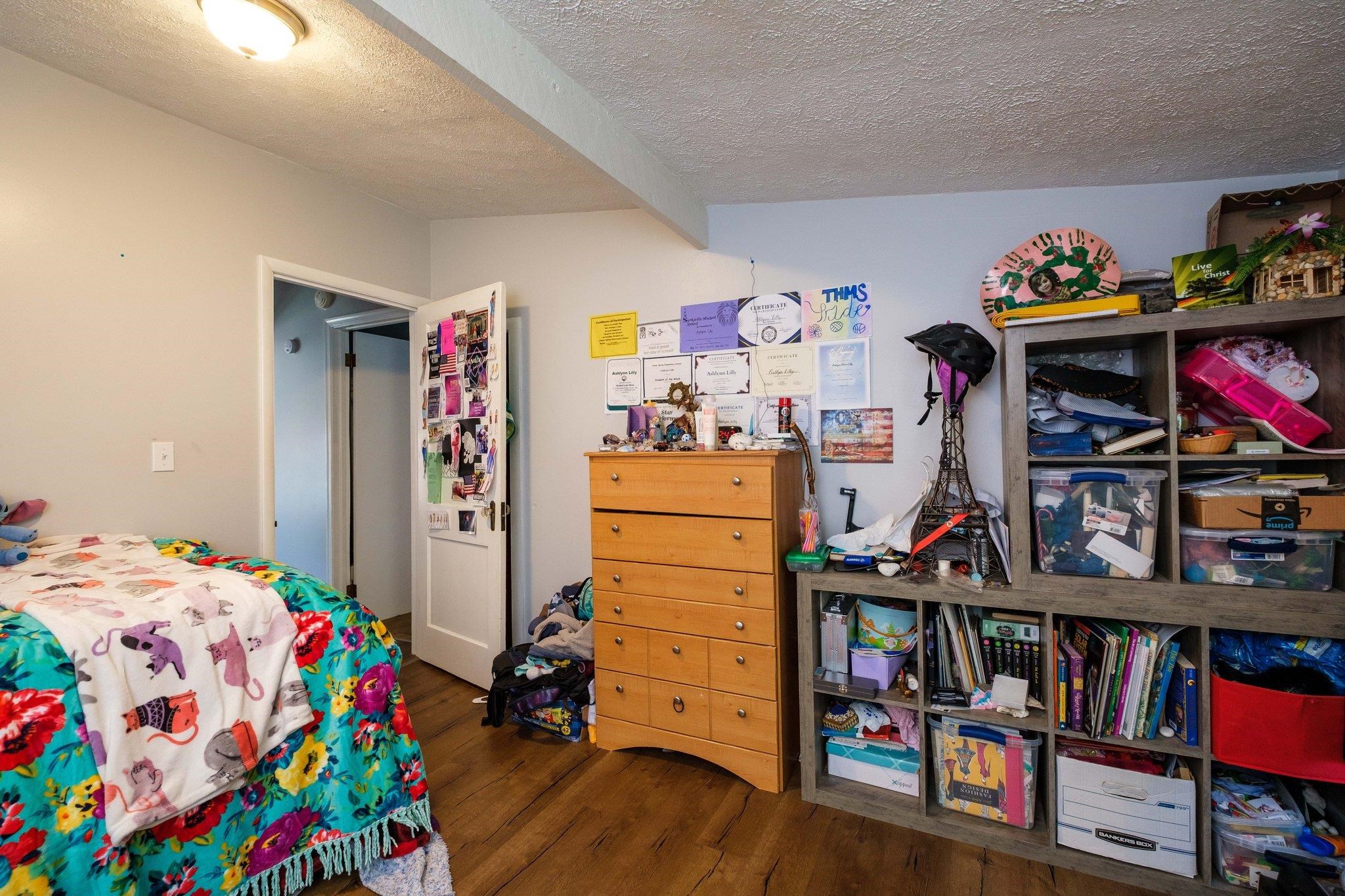 1057 Park Road Harrisonburg, VA 22802 - Photo 19 of 24 a kids bedroom with a bed and a book shelf