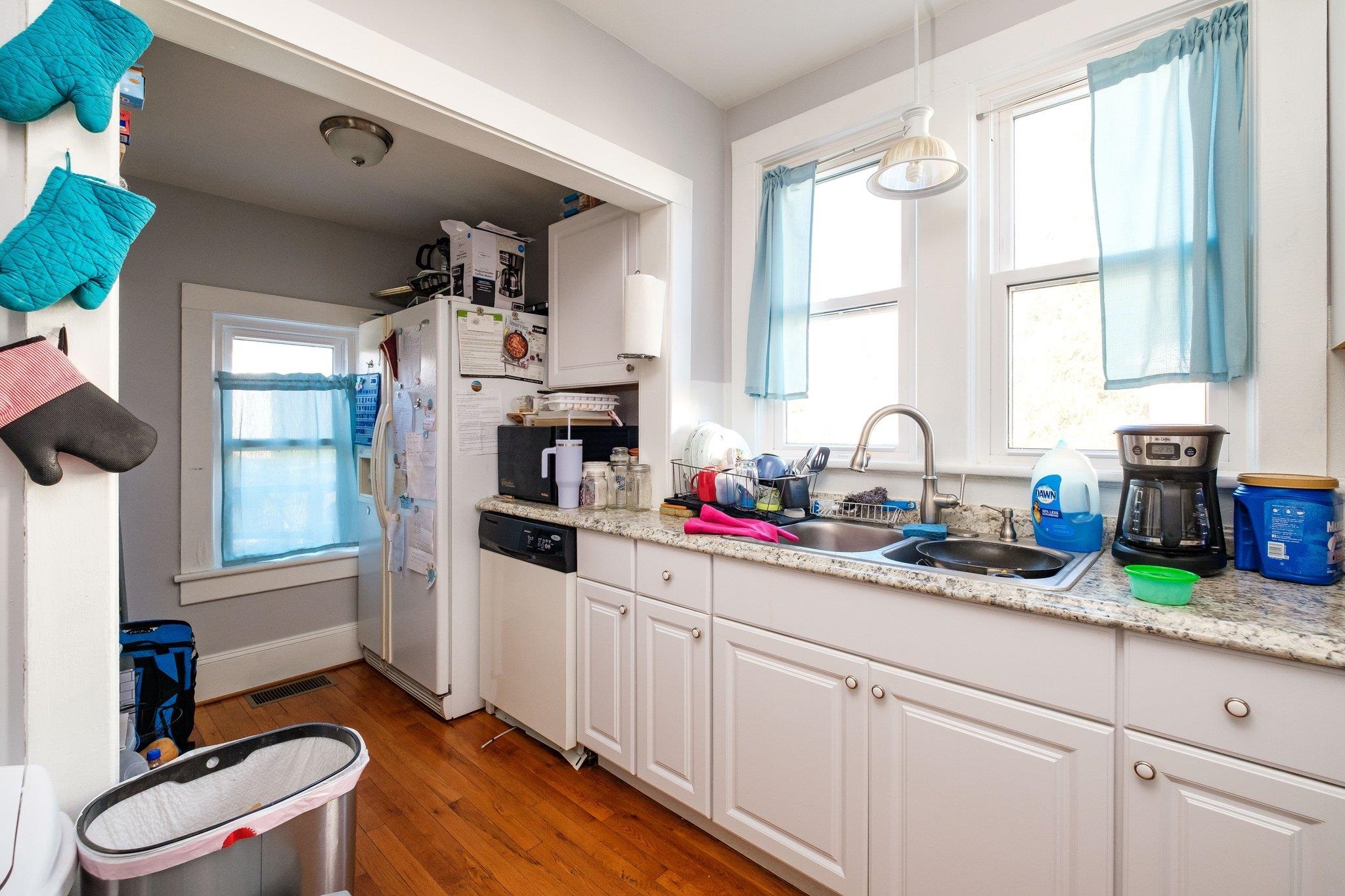 1057 Park Road Harrisonburg, VA 22802 - Photo 9 of 24 a kitchen that has a sink cabinets appliances and a window