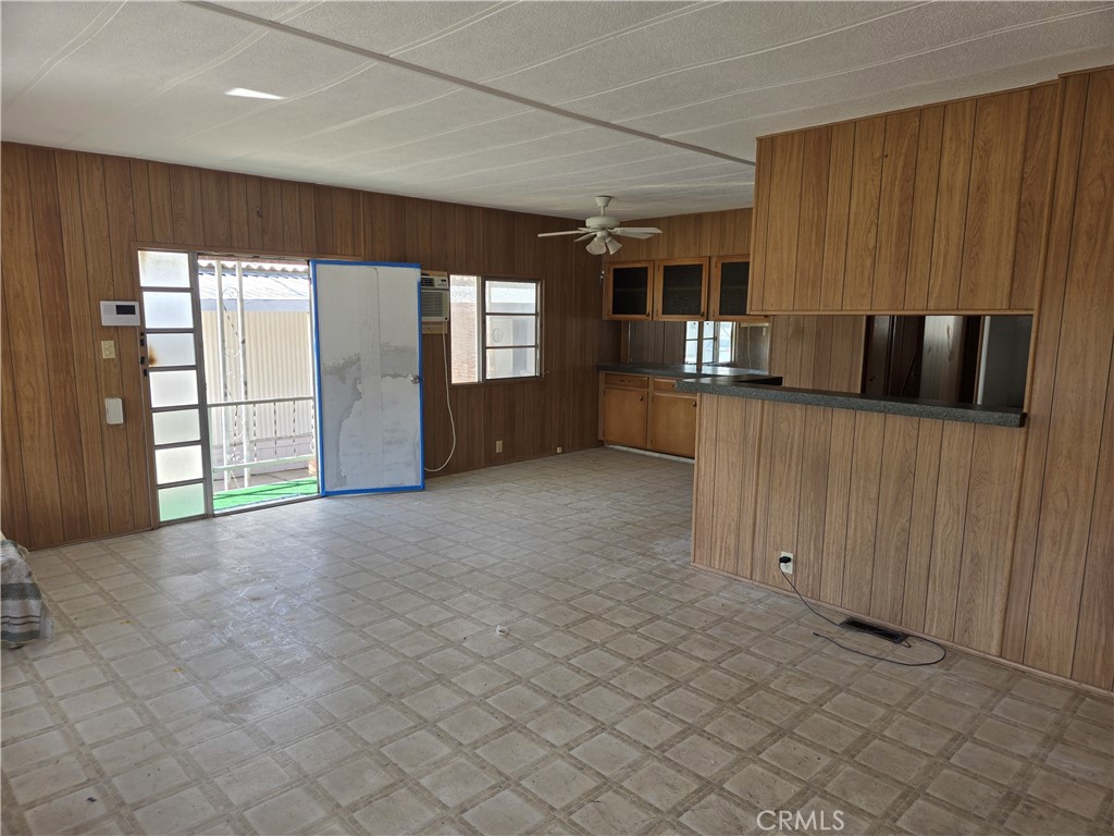 1700 State, Unit 56 Hemet, CA 92543 - Photo 2 of 10 an empty room with windows